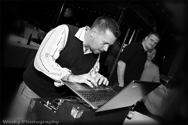 Jamie Parkes at DJ booth black and white by Winky Photography