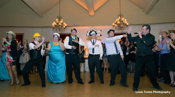 Guests dancing on dance floor at wedding reception with DJ Scott E. Cumming by Louis Torres Photography