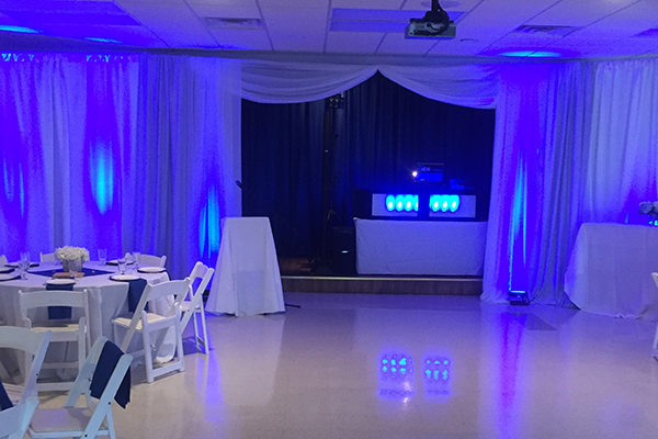 Blue up lighting at wedding reception