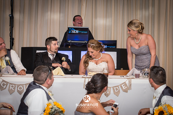 Bride and groom at wedding reception with DJ Scott E. Hemming by Susan Knott Photography