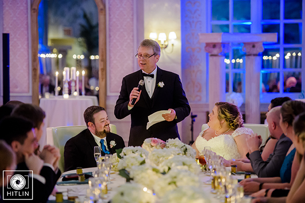 Man giving speech at wedding reception
