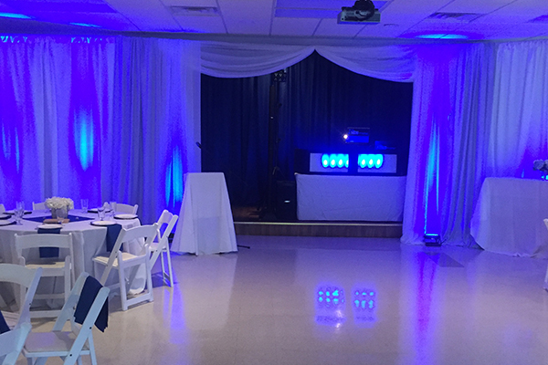 DJ Booth with blue up lighting 