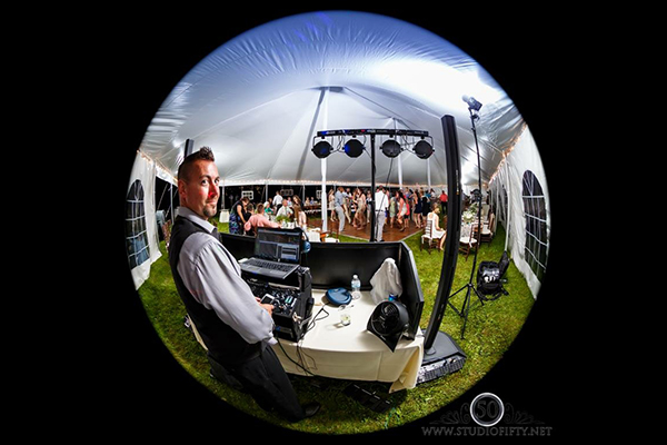 Jamie Parkes at DJ booth fisheye photo by Studio Fifty